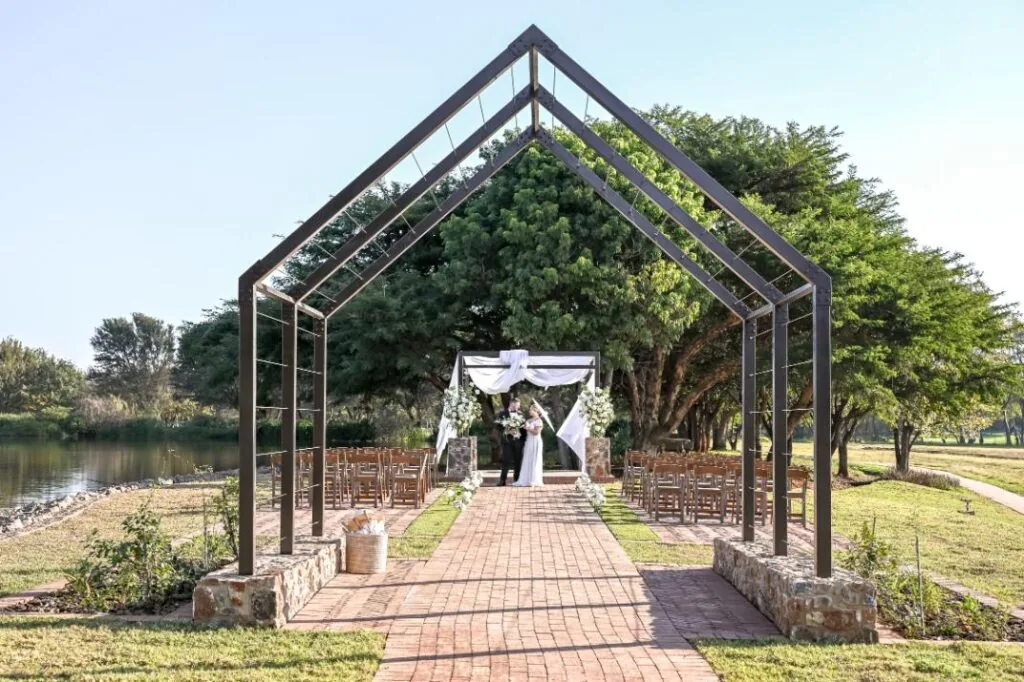 Lakeside wedding ceremony at Irene Country Hotel